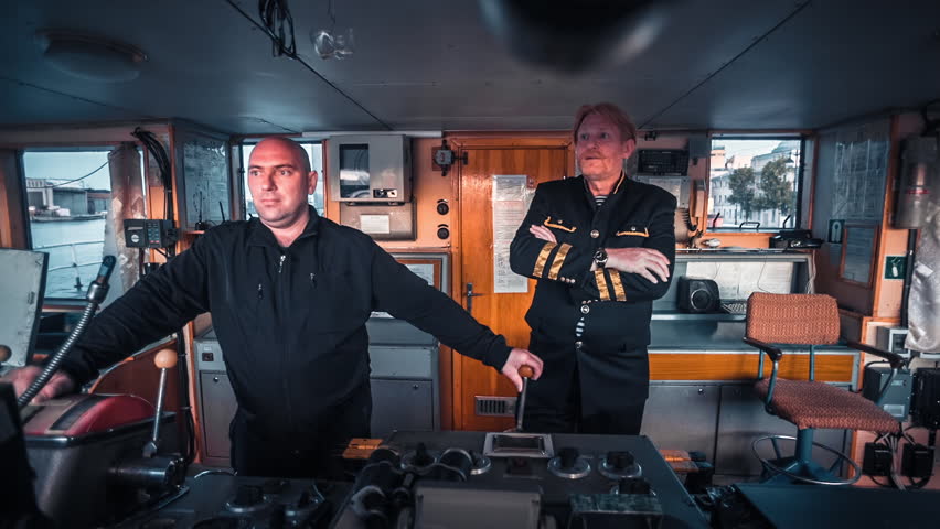The bridge, captain and staff captain on the navigation bridge