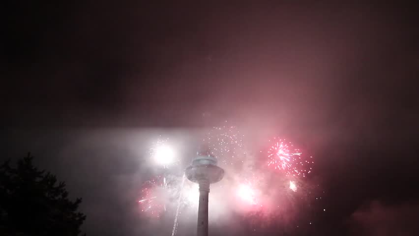 Lithuania, Vilnius television tower with a firework, 2011/12/31, Vilnius,