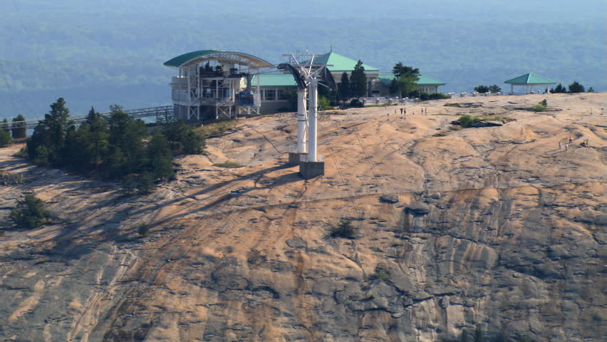 Aerial zoom-out to carving on Stone Mountain, Georgia. Shot in 2007.