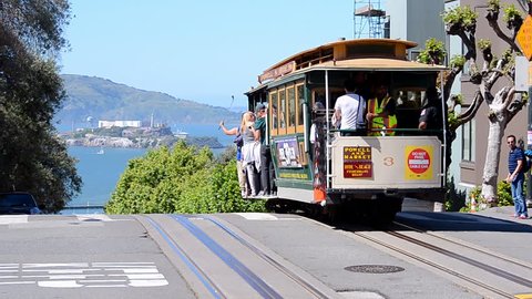 SAN FRANCISCO - APR 30: Cable car on April 30, 2017 in San Francisco, California, USA. The 1st successful cable-operated street railway was the Clay Str. Hill Railroad opened on August 2,1873. 