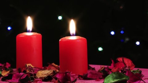 Red Candles and Bokeh Colorful Lights