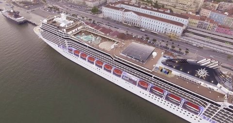 Lisbon, Portugal - May 5, 2017: Aerial shot of the big cruise ship in port on the Tagos river.