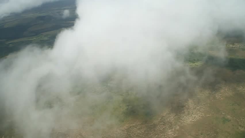 Aerial view of ladscape in Venezuela through clouds