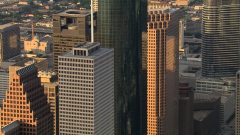 Close flight past downtown Houston skyscrapers in afternoon light. Shot in 2007.