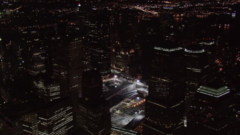 Night flight past Ground Zero to lower Manhattan. Shot in 2005.