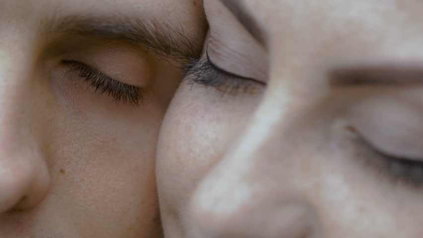 Male and female eyes. Couple in love. Close up eye view at camera