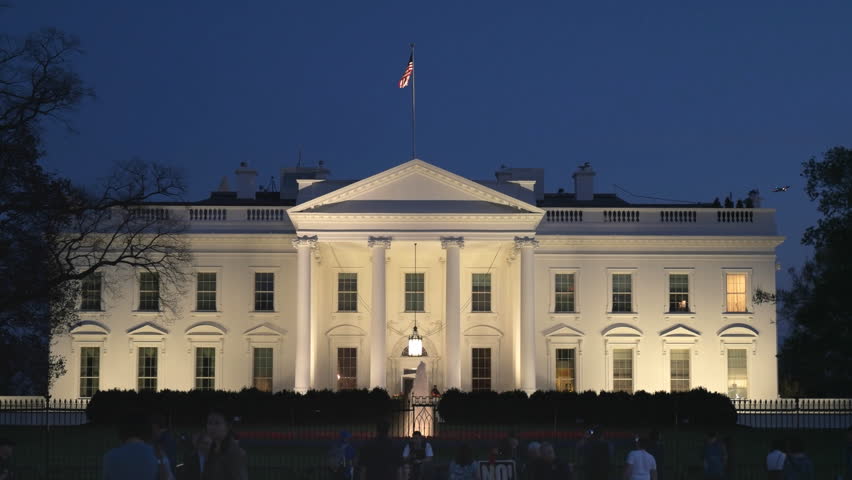 a dusk shot of the north side of the white house in washington d.c.
