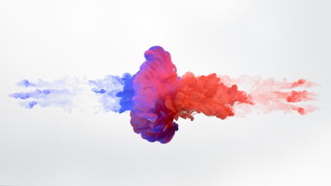 Color paint drops in water in slow motion. Ink swirling underwater. Cloud of silky ink collision isolated on white background. Colorful abstract smoke explosion animation. Close up camera view.