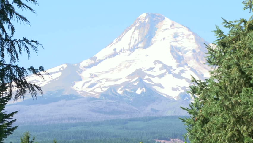 Zoom out from Mt Hood in Oregon to wedding altar location setting.