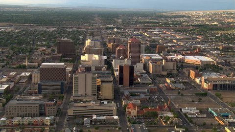 Wide orbit of Albuquerque with Sandia Mountains behind cityscape. Shot in 2008.