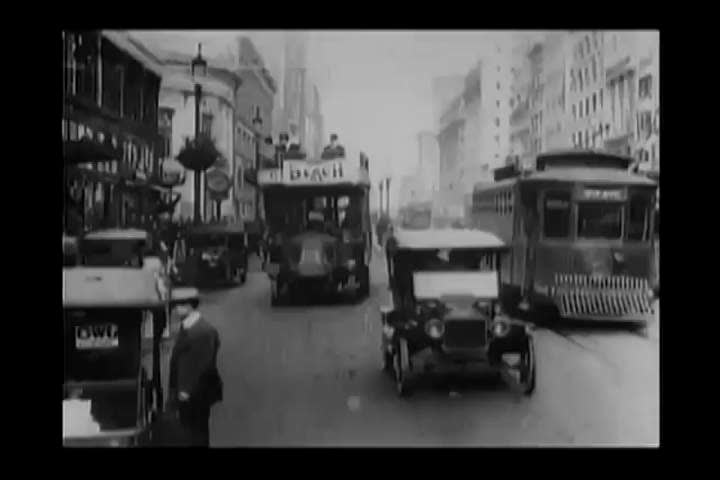 1910s: Jitney busses, the Hotel St. Francis and a new City Hall, under construction, are shown, during the Panama_Pacific International Exposition, in San Francisco, California, in 1915.