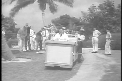 1950s: A Baltimore country club sets up a movable bar on their golf course, so players can get drinks at the end of the range in the 1950s.