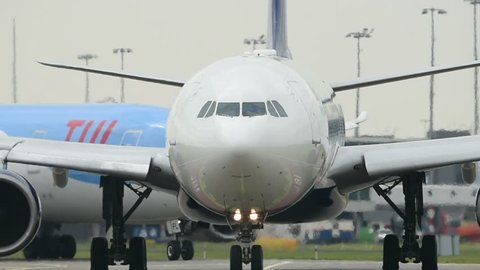 SCHIPHOL, AMSTERDAM, THE NETHERLANDS - MAY 5: Delta airlines A330 passenger plane taxiing to the runway on May 5, 2017 in Schiphol, Amsterdam, the Netherlands.