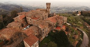 Aerial shot, an ancient small perched town in Tuscany, Italy, 4K