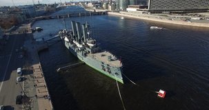 Aerial drone video with view of beautiful vintage architecture of St.-Petersburg, views of Neva River, old military cruiser, Finnish Bay and surroundings of the northern capital of Russia