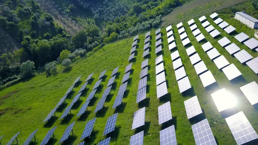 Solar panels farm field of green renewable energy on the italian hills.  | Shutterstock HD Video #26757838