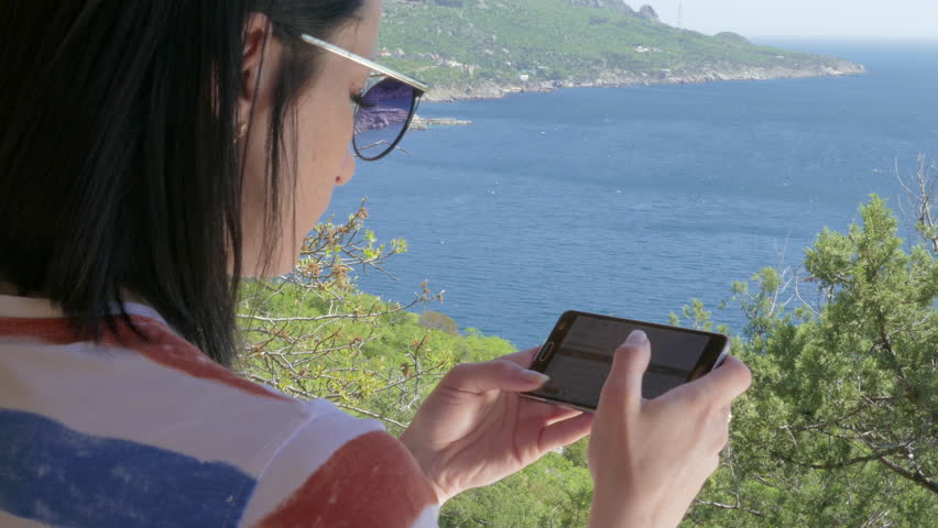 Woman Use A Smart Phone, Beautiful View Of Ocean, Landscape, Mobile Technologies In Nature  | Shutterstock HD Video #26759077