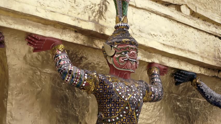 Close up of allegorical figures in a Buddhist temple