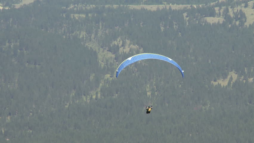 Paragliding high above the Columbia Valley at Invermere, British Columbia,