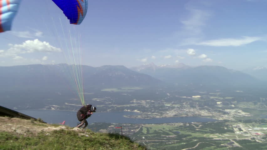 Paragliding high above the Columbia Valley at Invermere, British Columbia,
