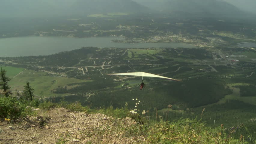 Hang gliding high above the Columbia Valley at Invermere, British Columbia,