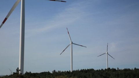 Wind electric generator. Wind power turbines in the mountains