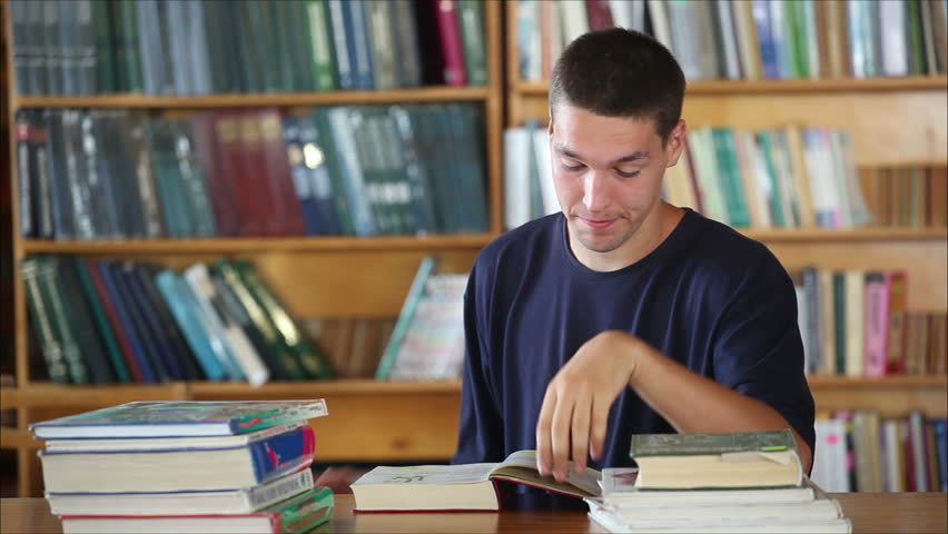 Tired Student in the Library Stockvideoklipp (helt royaltyfria) 2679587 |  Shutterstock