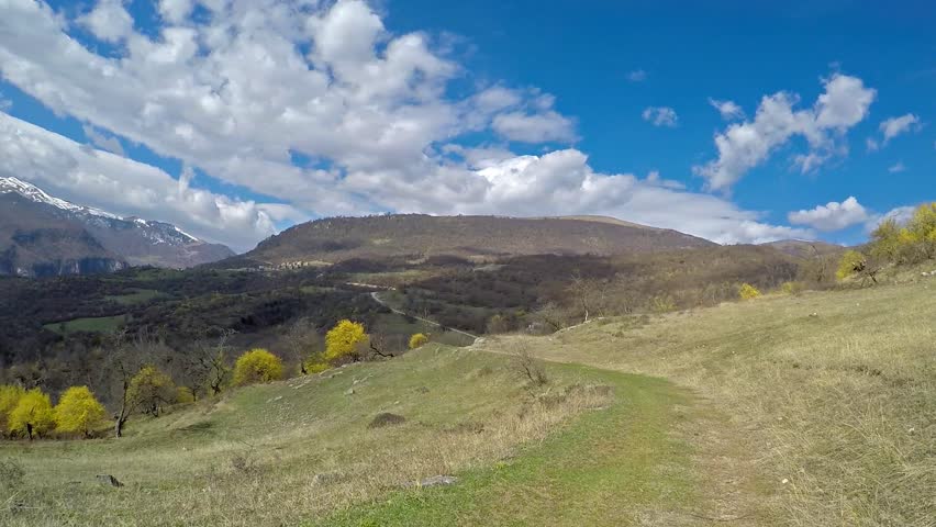 Mountain panorama, Tavush region, Ijevan, Armenia. Spring, blooming cotoneaster.