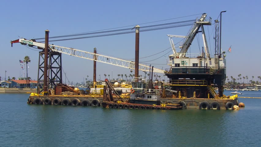 Long Beach, CA/USA- 08/05/2012: A harbor dredging barge by the Dutra company
