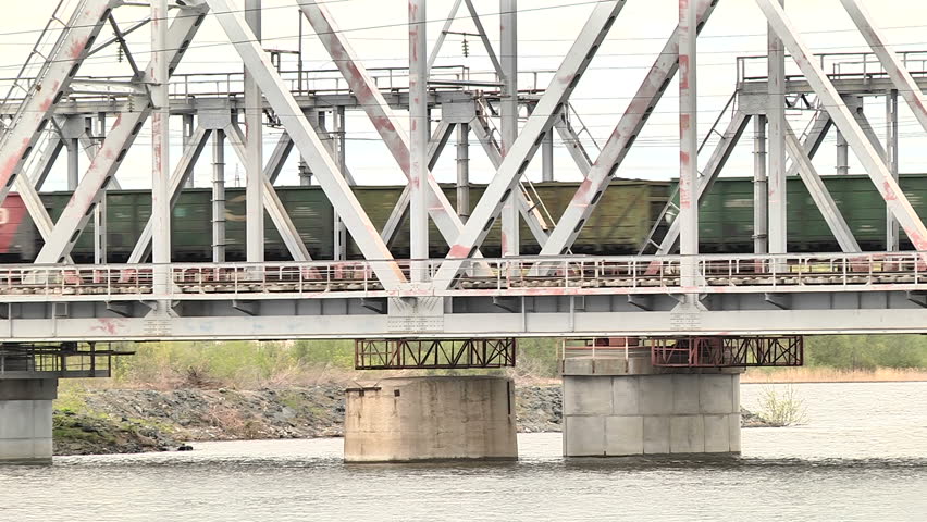 Freight train goes over the bridge