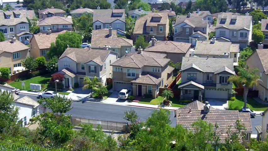 A high angle view of new suburban homes on a residential street in the suburbs