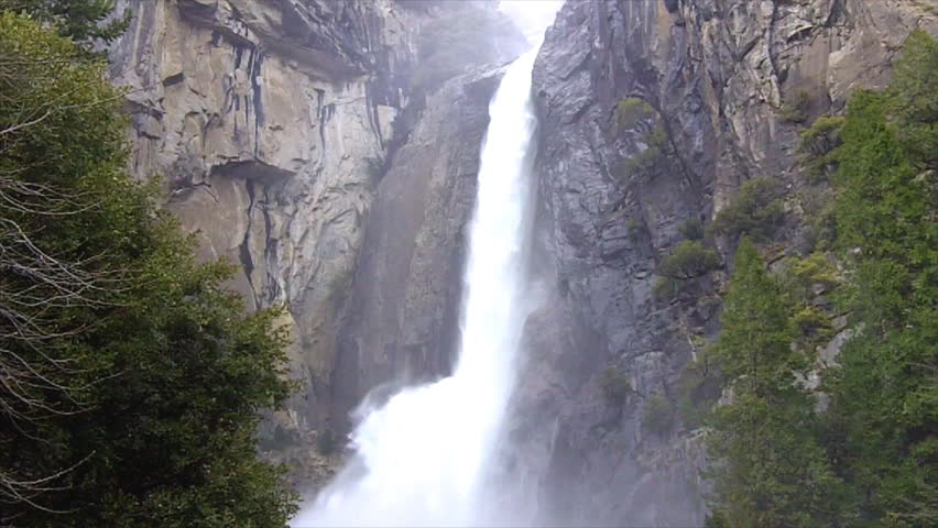 A close up shot of Lower Yosemite Falls water cascading over mountainside with