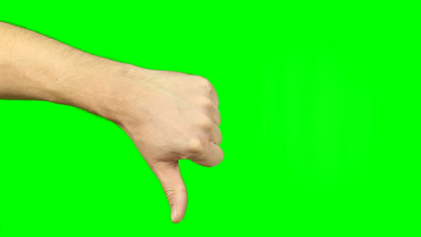 Thumbs down sign hand gesture on green screen. Simbol of disapproval dislike negative emotion. Footage contains solid green instead alpha channel easy keying. Male hand thumbs-down gestures.