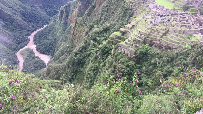 Machu Picchu, the most familiar icon of Inca civilization. Machu Picchu is a 15th-century Inca citadel situated on a mountain ridge above the Sacred Valley northwest of Cuzco, Cusco Region, Peru.