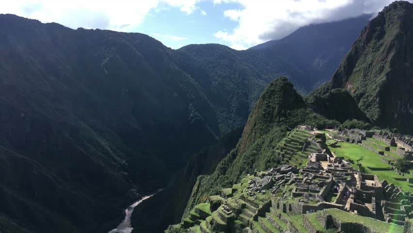 Machu Picchu, the most familiar icon of Inca civilization. Machu Picchu is a 15th-century Inca citadel situated on a mountain ridge above the Sacred Valley northwest of Cuzco, Cusco Region, Peru.