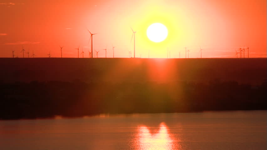 Wind turbines at sunset timelapse.