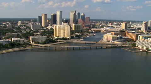 Low flight over water approaching downtown Tampa, Florida
