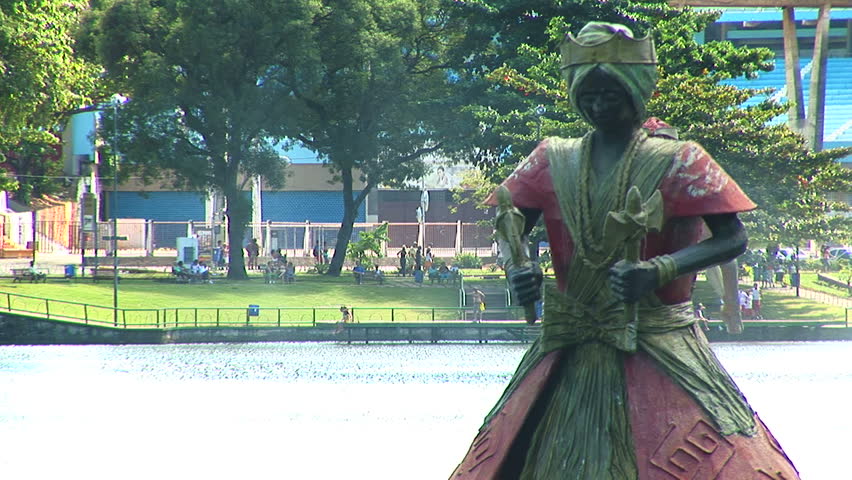 Statue at Dique do Tororo in Salvador, Brazil in the foreground