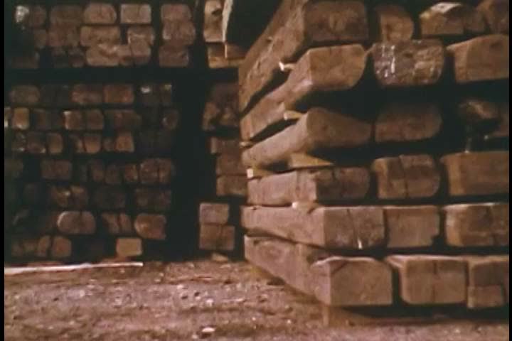 1960s: Two balls bounce and roll their way through sometimes-intimidating piles of lumber in 1969.