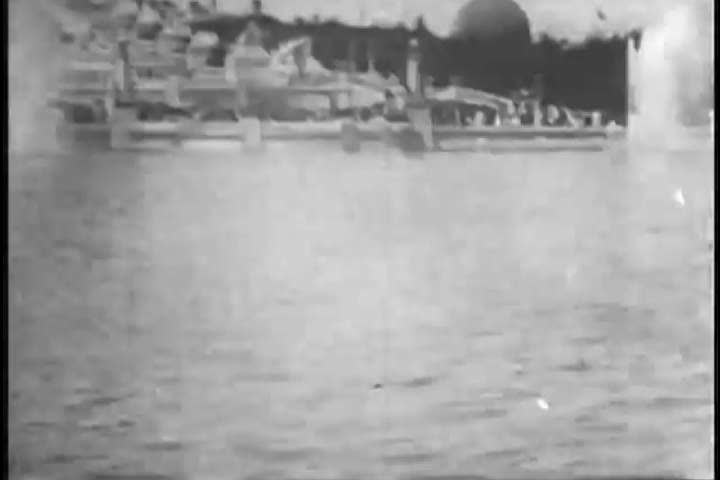 1900s: Various watercraft parade down a watercourse, at the Saint Louis Exposition, in Missouri, in 1904.