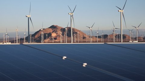 Solar panels and wind turbines, renewable energy production