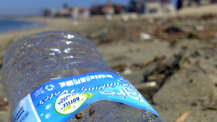 LONG BEACH, CA/USA â August 11, 2012: A half decayed plastic bottle that