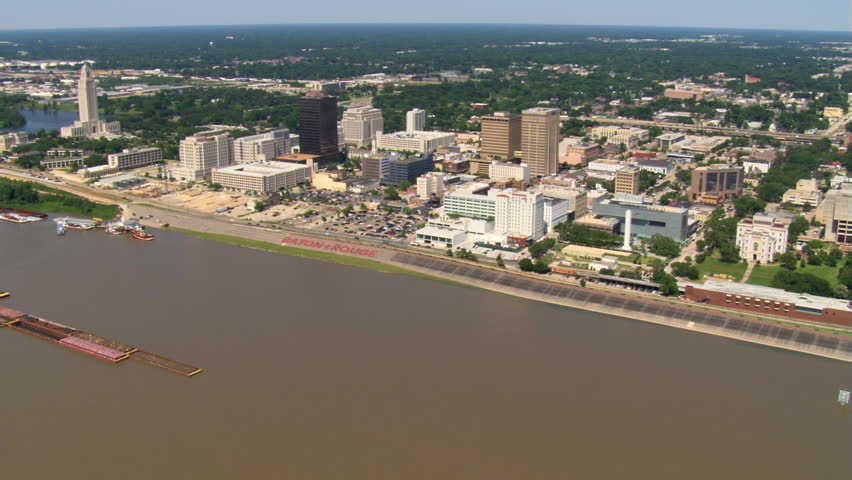 Approaching and orbiting downtown Baton Rouge near Louisiana capitol building. Shot in 2007.