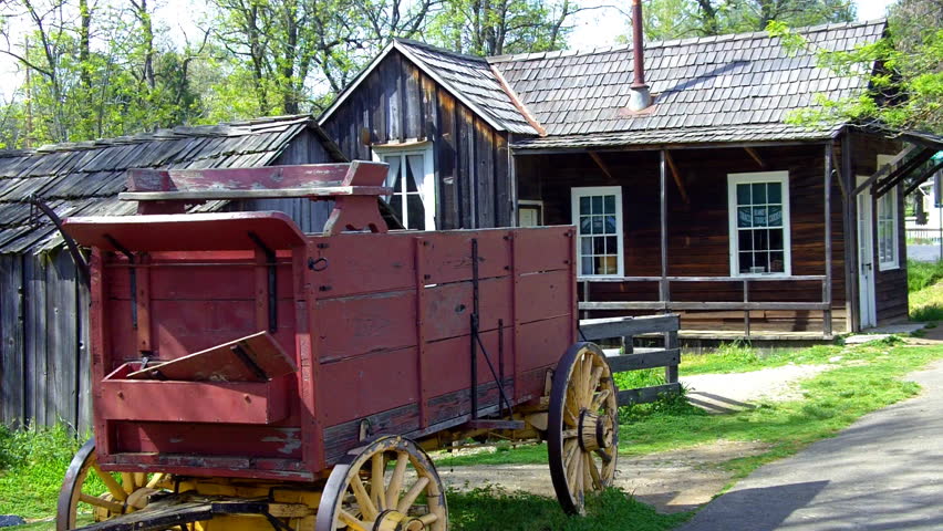 An old west wagon and home at Columbia State Historic Park circa 2012 in