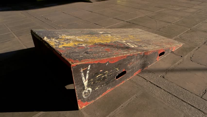 Legs of rollerblader and ramp. Person on inline skates jumping. Straight into the air.