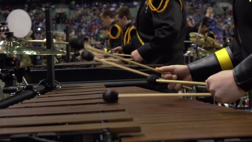 Close of a marimba played by the percussion section of a marching band