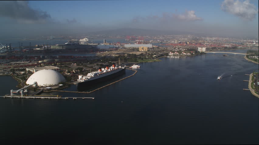 Flying past the Queen Mary moored in Los Angles Harbor at Long Beach, California. Shot in 2010.