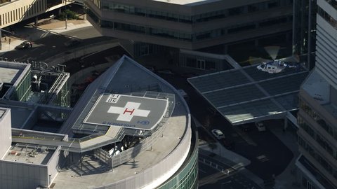 Aerial view of a helicopter approaching and landing at Children's Hospital of Philadelphia. Shot in 2011.