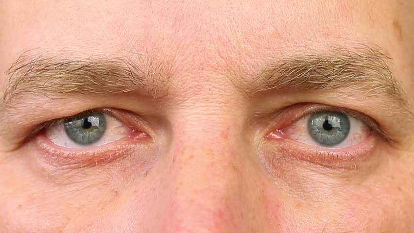 Adult man blinking his eyes. Extreme close-up view. Human eyes fast open up and shut down. REM rapid eye movement. See dreams sleep and wake up rapidly. Caucasian male face close open eyes. Royalty-Free Stock Footage #26881738