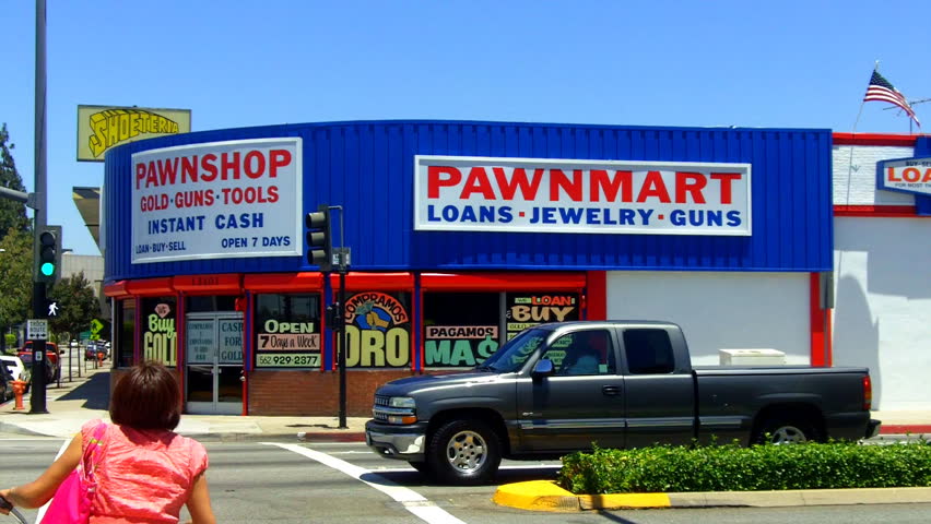 NORWALK, CA/USA- August 6, 2012: A pawn shop on a busy street corner illustrates